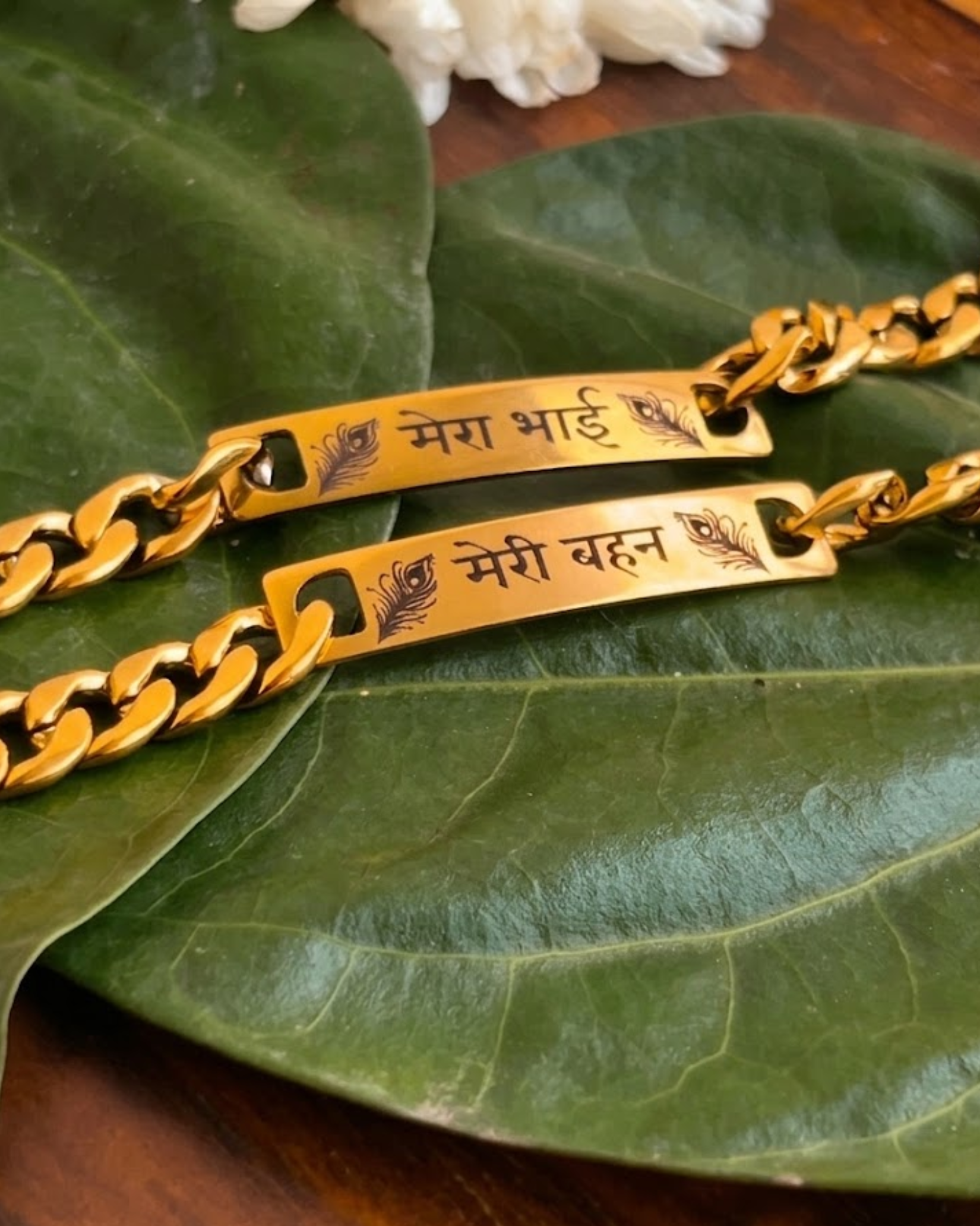 Mera Bhai and Meri Behen bracelets on a leaf