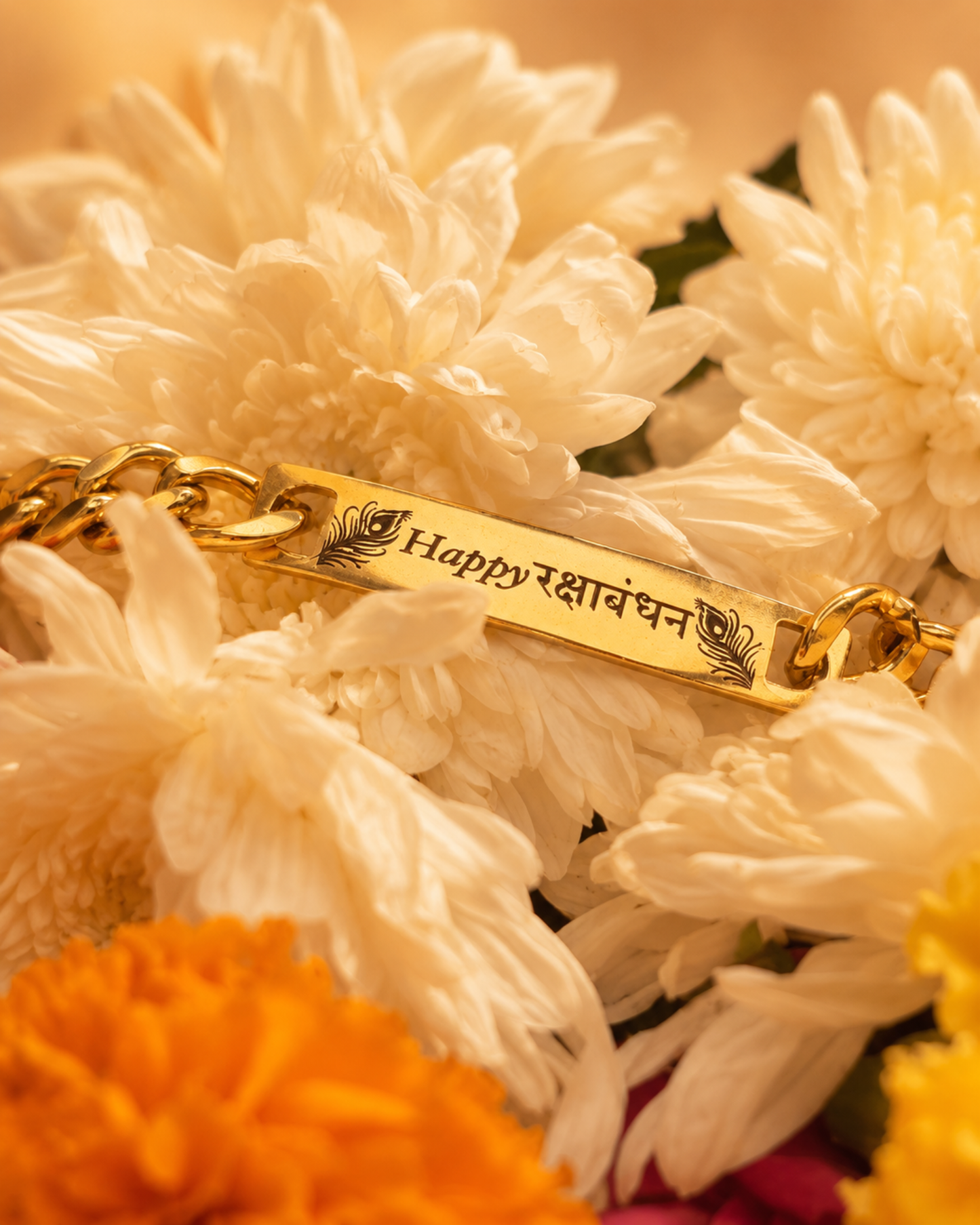 Happy Rakshabandhan engraved bracelet with marigold