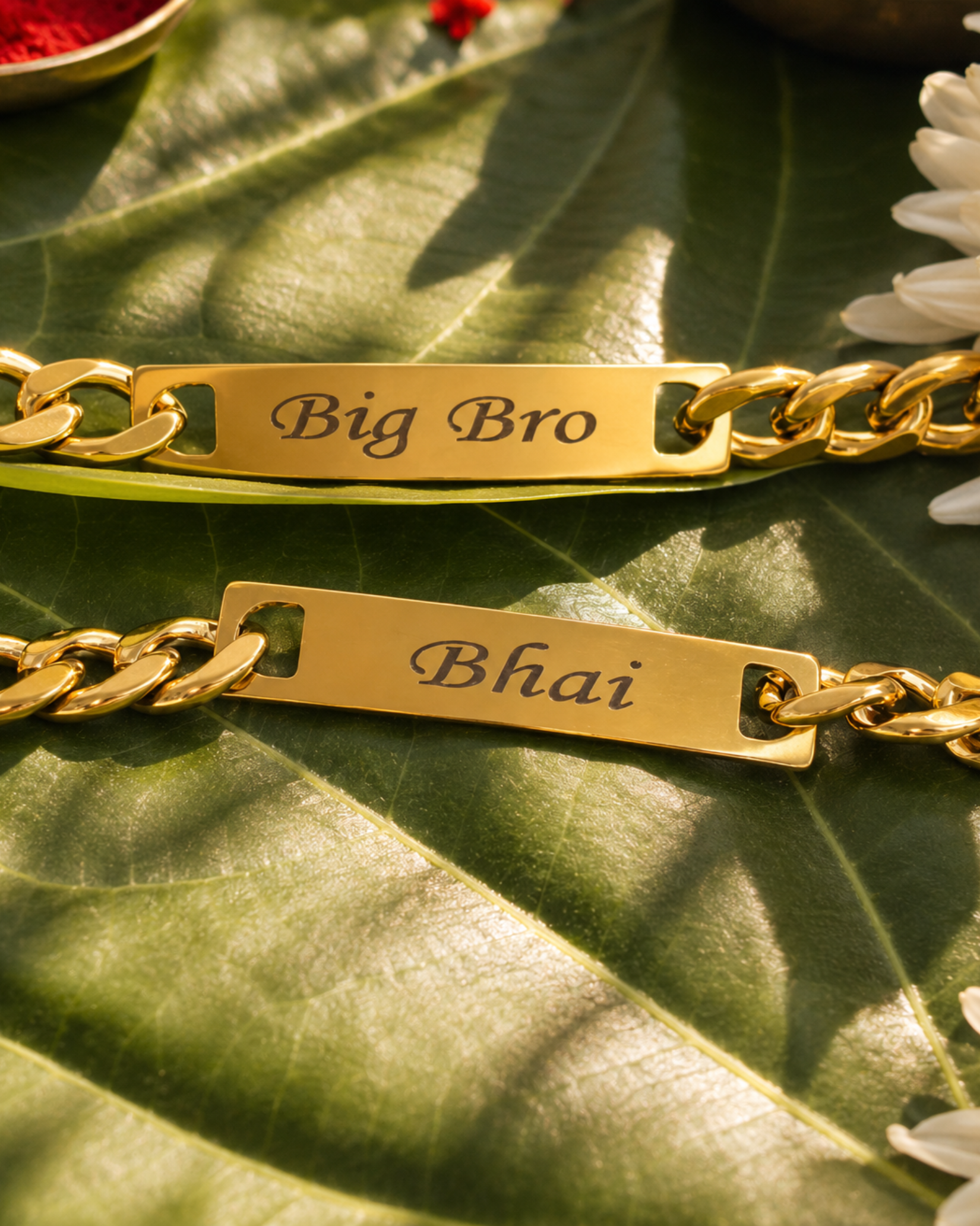 Big Bro and Bhai bracelets on a green leaf